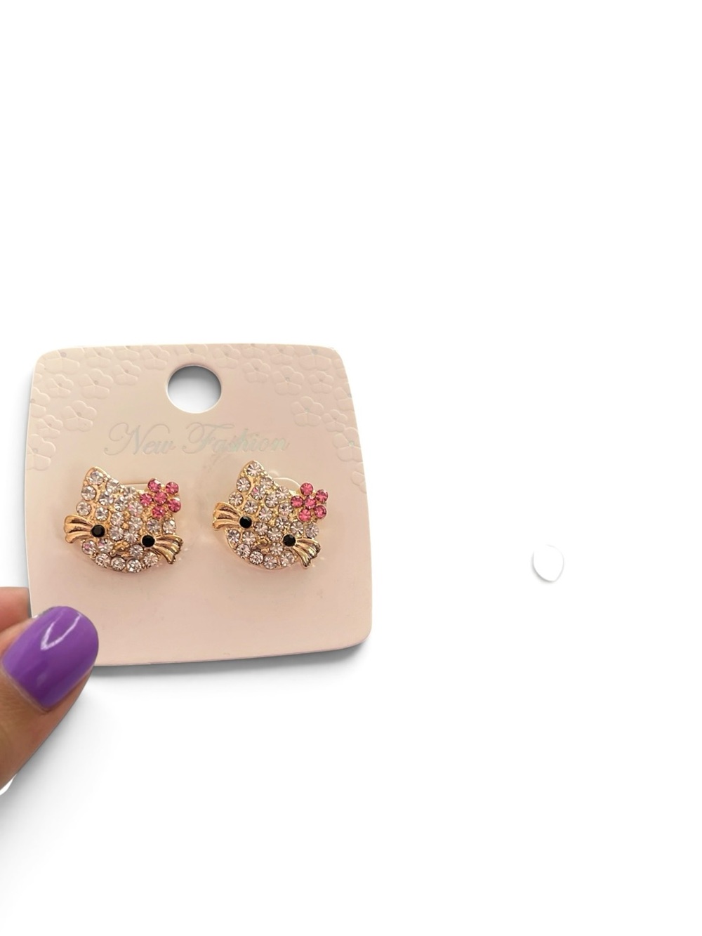 RHINESTONE GOLD TONE HELLO KITTY PIERCED STUD EARRINGS WITH A PINK FLOWER